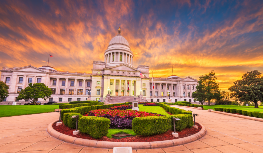 Arkansas state capitol building at sunset