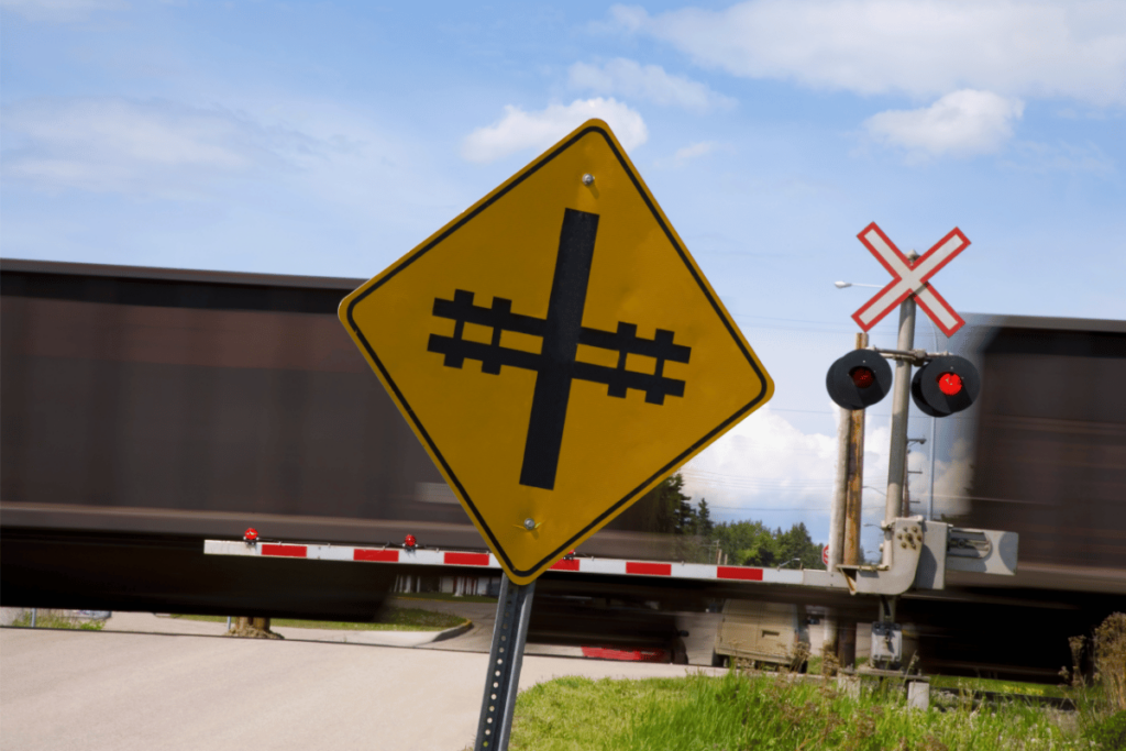 Railroad Crossing with train coming through