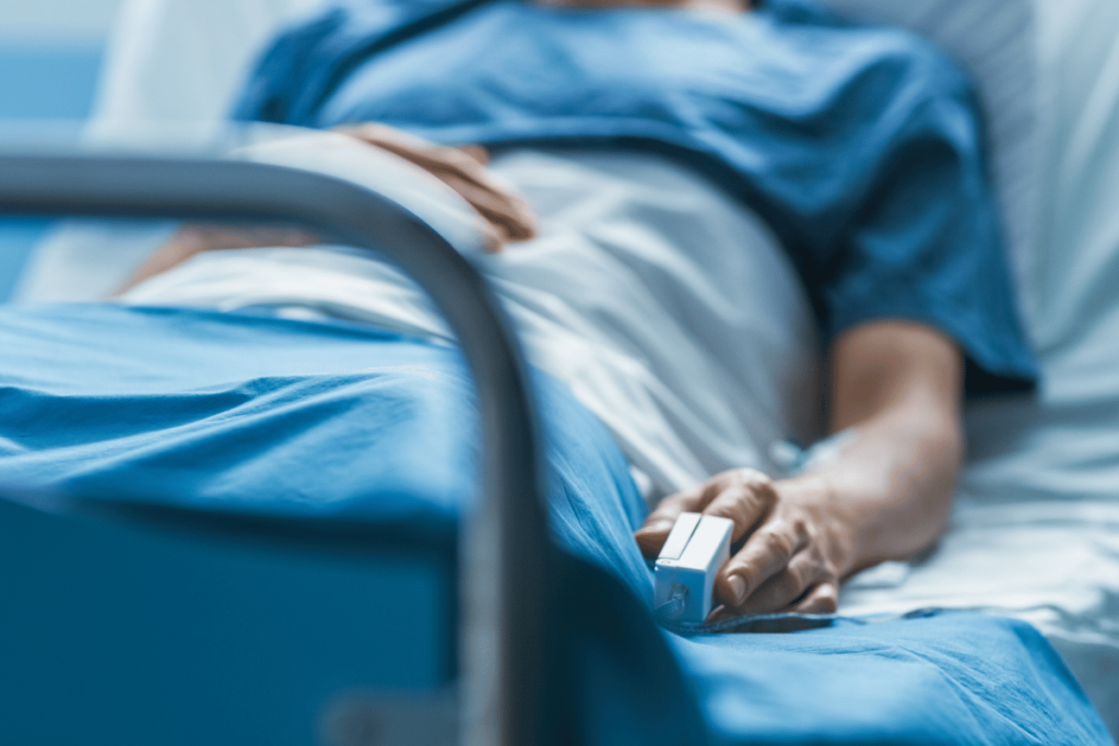 Patient sleeping in bed with monitors attached