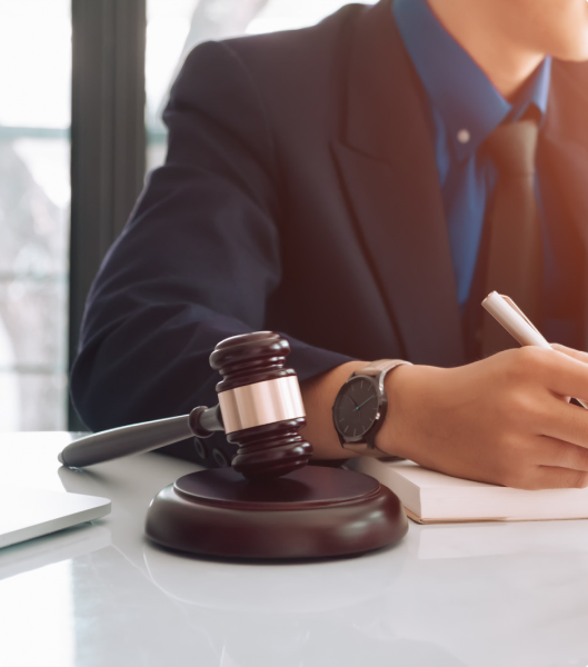 An attorney and a gavel on the table