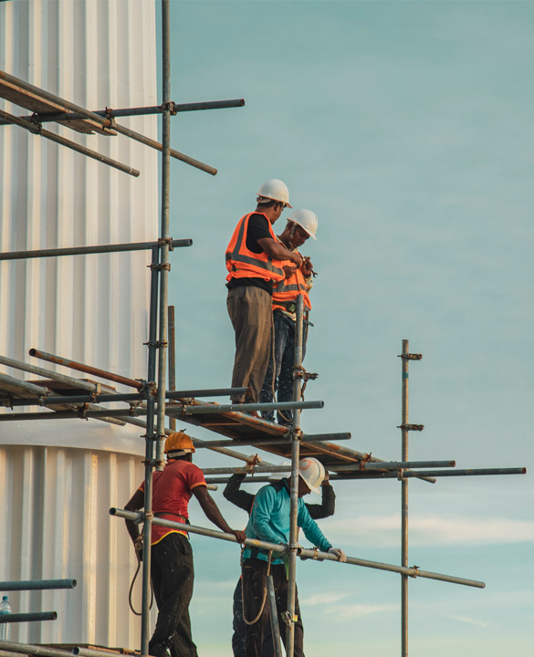 construction workers on scaffolding