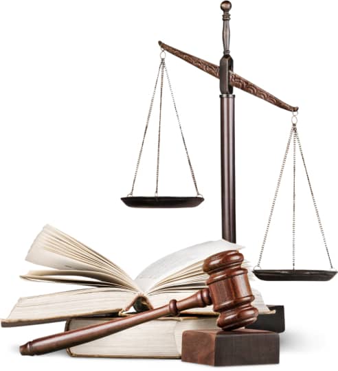 a gavel, law book and justice scale