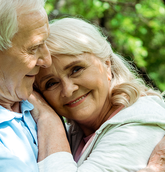 the Gori Law Firm You Mesothelioma Lawyers and Asbestos Exposure Attorneys. Close up of a couple hugging.