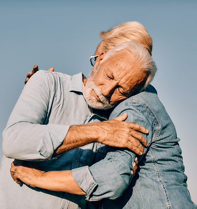 The Gori Law Firm You Mesothelioma Lawyers and Asbestos Exposure Attorneys. A couple hugging.