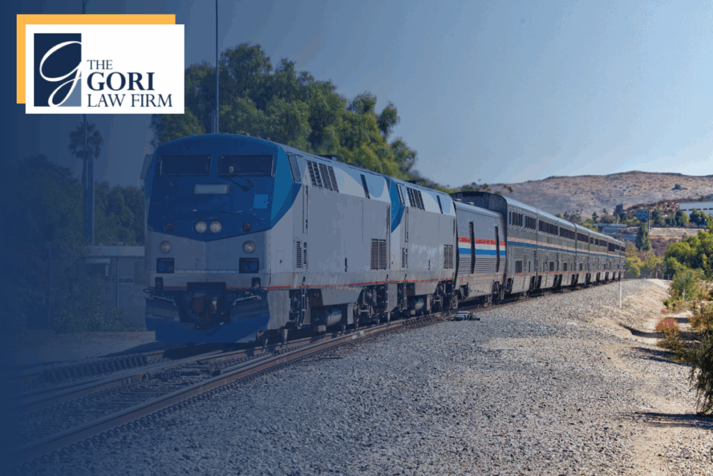 An Amtrak train coming towards the camera. The Gori Law Firm